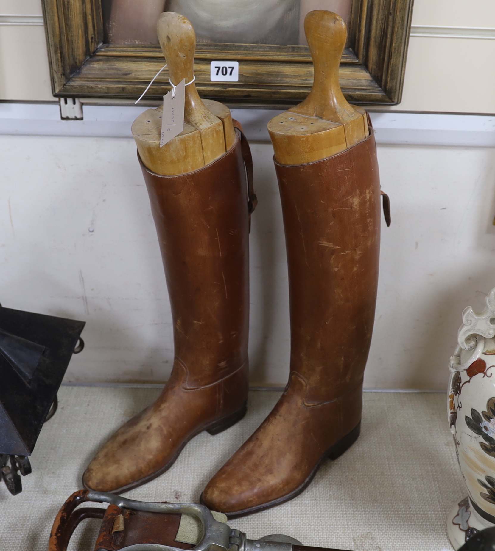 A pair of leather riding boots, with boot trees, and Howell shooting stick, 82cm in length